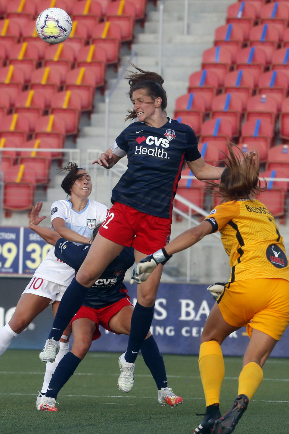 Washington Spirit midfielder Andi Sullivan (12) heads the ball as Chicago Red Stars' Vanessa DiBernardo watches during the first half of an NWSL Challenge Cup soccer match at Zions Bank Stadium, Saturday, June 27, 2020, in Herriman, Utah. (AP Photo/Rick Bowmer)