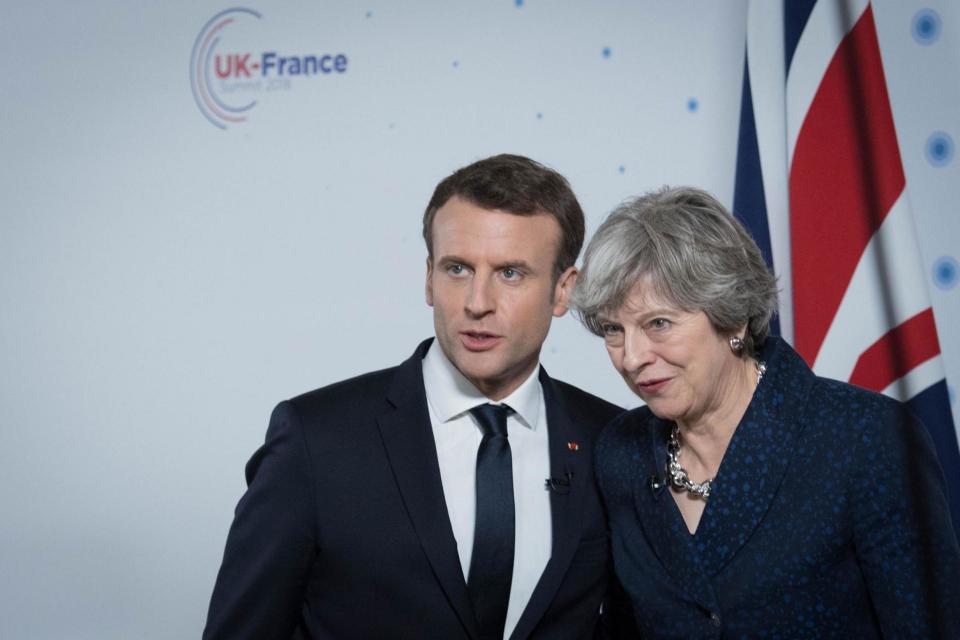 Prime Minister Theresa May and French President Emmanuel Macron during a press conference: PA Wire/PA Images