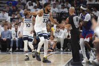 Minnesota Timberwolves center Karl-Anthony Towns (32) reacts toward referee Jacyn Goble (68)during the first half of Game 3 of an NBA basketball second-round playoff series against the Denver Nuggets, Friday, May 10, 2024, in Minneapolis. (AP Photo/Abbie Parr)