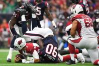 Nov 19, 2017; Houston, TX, USA; Houston Texans outside linebacker Jadeveon Clowney (90) sacks Arizona Cardinals quarterback Blaine Gabbert (7) during the fourth quarter at NRG Stadium. Mandatory Credit: Shanna Lockwood-USA TODAY Sports