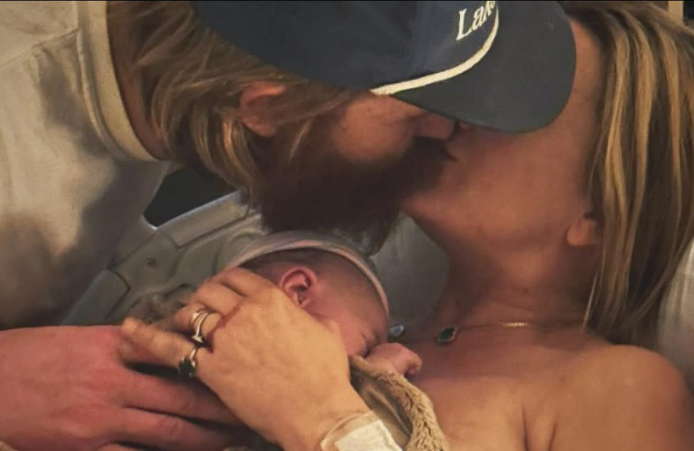 Wyatt Russell and Meredith Hagner with their new baby (c) Instagram credit:Bang Showbiz