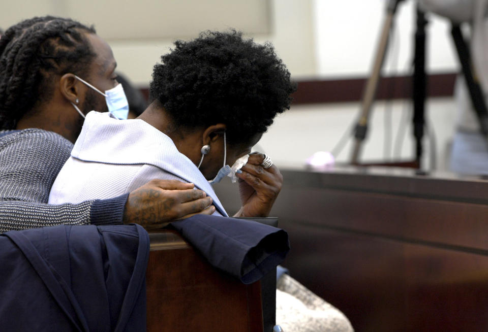 Shaundelle Brooks weeps while listening to victim impact statements at Justice A.A. Birch Building in Nashville, Tenn., on Saturday, Feb. 5, 2022. Jurors are hearing testimony about whether or not to make parole possible after 51 years in prison for Travis Reinking, the man who shot and killed four people at a Nashville Waffle House in 2018. Jurors on Friday rejected Reinking’s insanity defense as they found him guilty on 16 charges, including four counts of first-degree murder. (Nicole Hester/The Tennessean via AP, Pool)