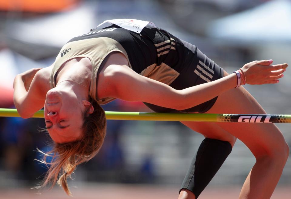 Wichita Falls Rider's Kylie Flippin competes in the Region I-5A high jump, Friday, April 29, 2022, at Lowrey Field at PlainsCapital Park.