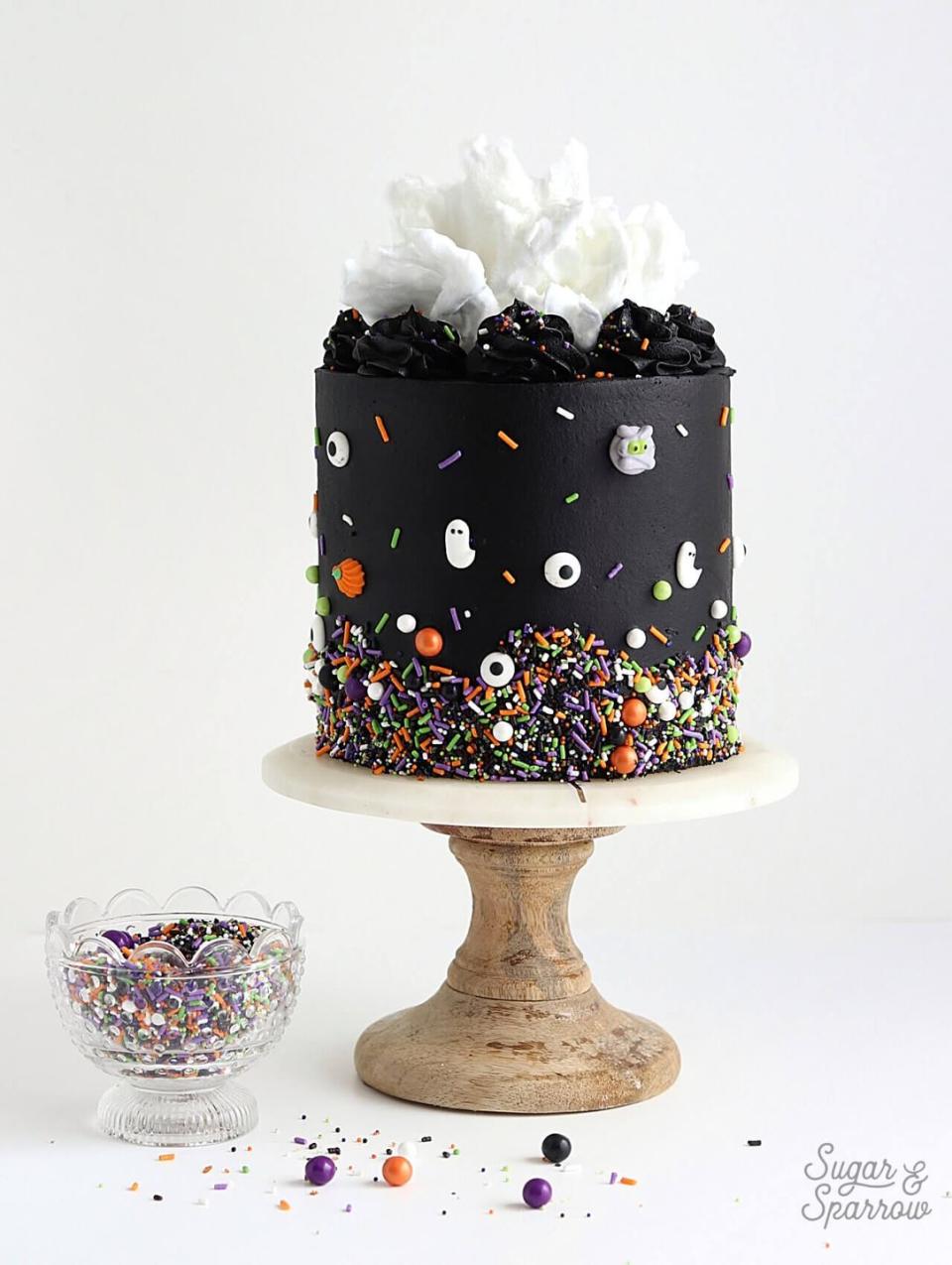 <p>Get the <a href="https://sugarandsparrow.com/halloween-cake/" rel="nofollow noopener" target="_blank" data-ylk="slk:Spooky Black Buttercream Halloween Cake;elm:context_link;itc:0;sec:content-canvas" class="link ">Spooky Black Buttercream Halloween Cake</a> recipe. </p><p>Recipe from <a href="https://sugarandsparrow.com/" rel="nofollow noopener" target="_blank" data-ylk="slk:Sugar and Sparrow;elm:context_link;itc:0;sec:content-canvas" class="link ">Sugar and Sparrow</a>. </p>