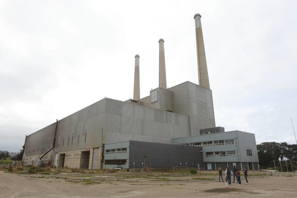 Vistra Corp. offered to demolish the Morro Bay Power Plant and stacks as part of the battery plant project. Vistra representatives tour the plant site on April 24, 2024. David Middlecamp/dmiddlecamp@thetribunenews.com