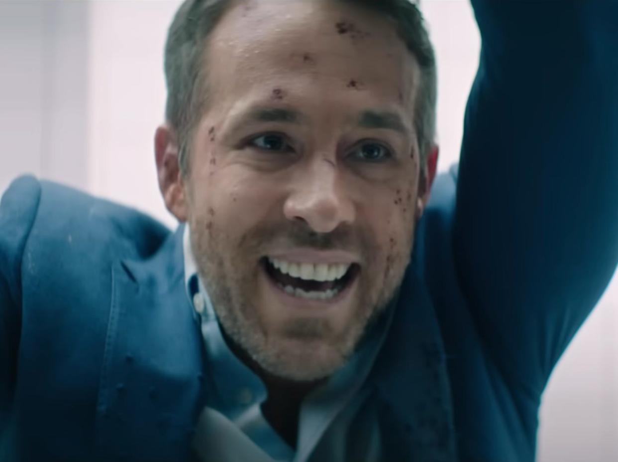 Ryan Reynolds with bruises on his face in “The Hitman's Wife's Bodyguard.”