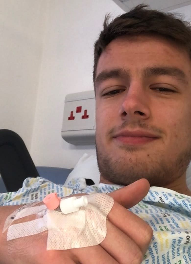 Morgan had surgery to replace the cancerous testicle with a prosthetic on 30 October, 2019. He is pictured recovering from the procedure. (Supplied: Movember)