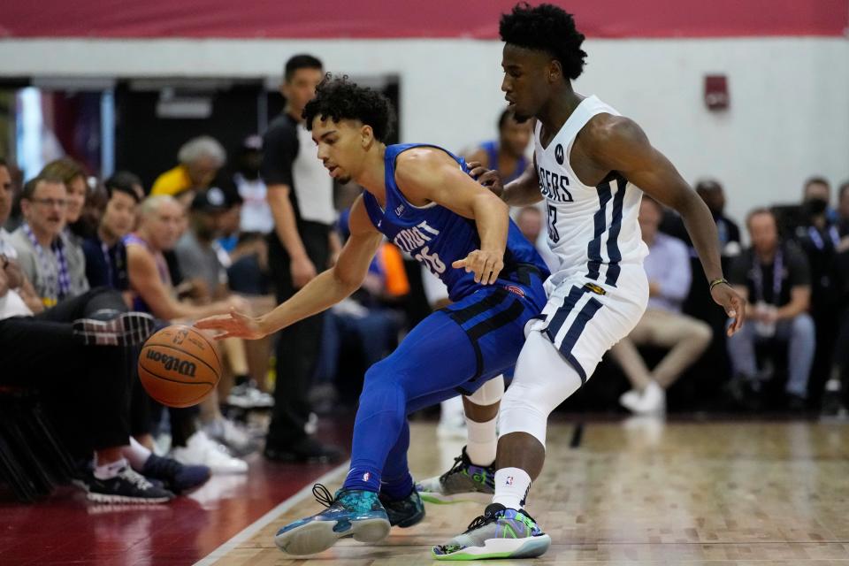 Pistons guard Jules Bernard, left, and Pacers guard Aaron Nesmith battle for the ball during the first half of the Summer League game on Tuesday, July 12, 2022, in Las Vegas.