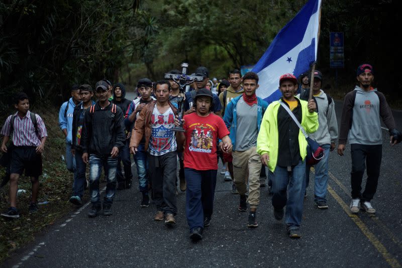 Hondurans take part in a caravan of migrants heading toward the U.S., in Chiquimula