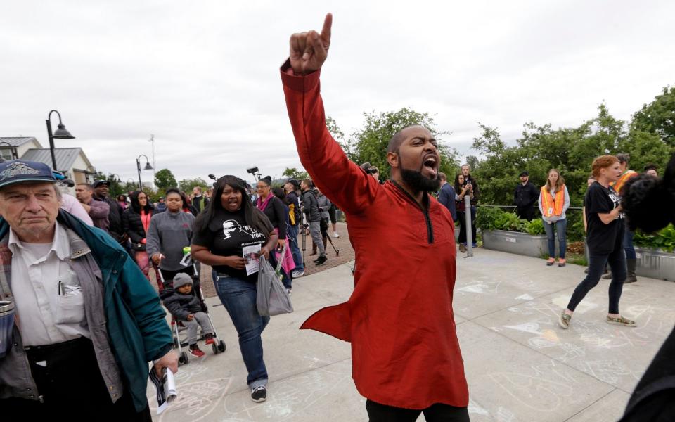 Andre Taylor, whose brother Che Taylor was killed by police in 2016 - AP Photo/Elaine Thompson