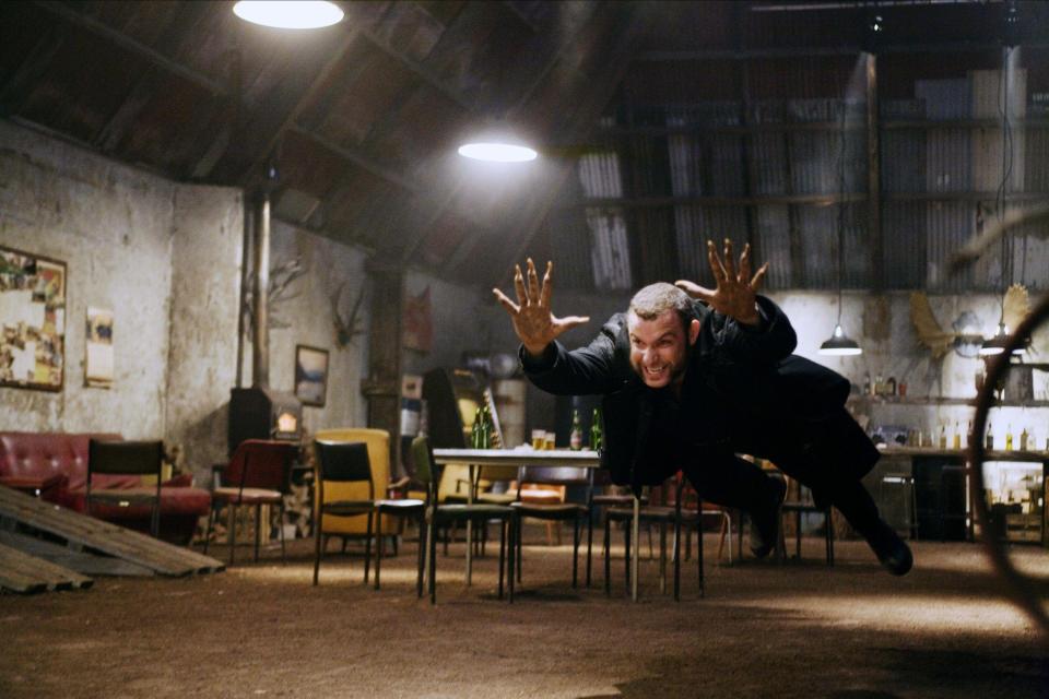 Sabretooth leaps in a rage in an empty bar in "X-Men Origins: Wolverine"