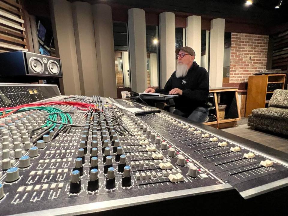 Ron Flack, owner of Realgrey Records, is shown inside Our Carriage House Recording Studio in Canton. Realgrey will hold an open house on Sunday marking the addition of a new recording room and Realgrey's 20th anniversary.