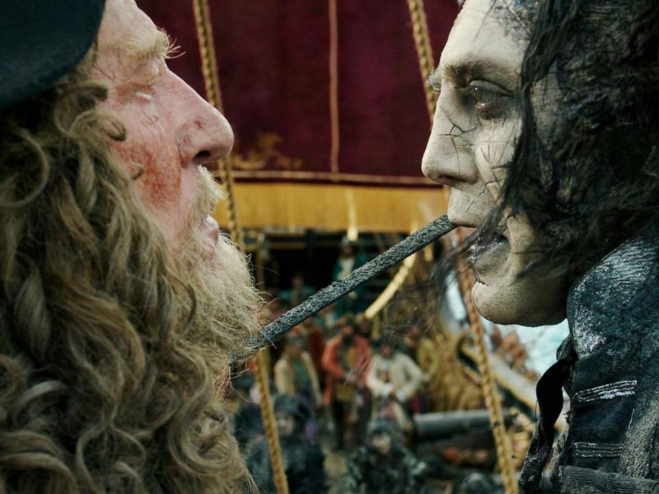 On board: Geoffrey Rush (left) and Bardem in the new Pirates film (Walt Disney)