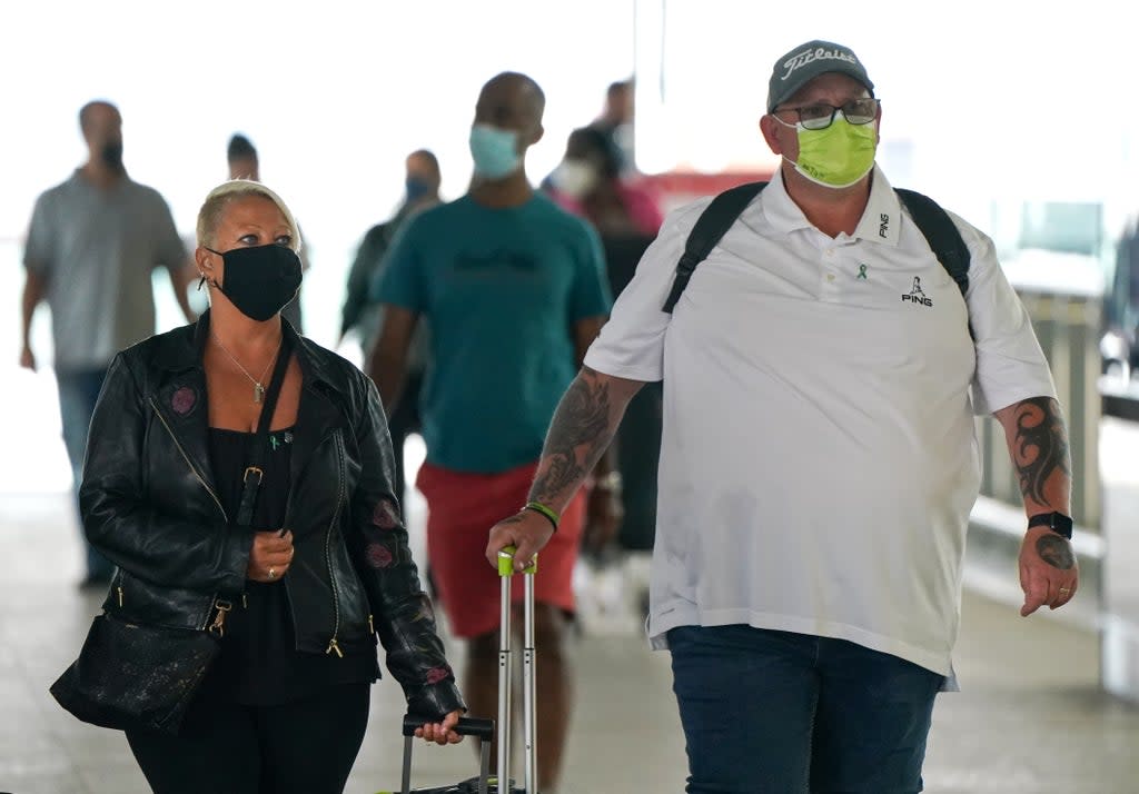 Charlotte Charles (left) and Tim Dunn, the parents of Harry Dunn arrive at Terminal 2 of Heathrow Airport, London, before departing on a flight to the US to give evidence under oath as part of a damages claim against their son???s alleged killer. Picture date: Tuesday June 29, 2021. (PA Wire)