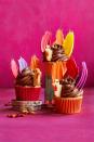 <p>Use candy melts to make the colorful tails on these adorable turkey cupcakes. And no, they are not turkey-flavored, they are vanilla.</p><p><em><a href="https://www.womansday.com/food-recipes/food-drinks/a29463836/turkey-cupcake/" rel="nofollow noopener" target="_blank" data-ylk="slk:Get the Shake Your Tail Feathers Cupcake recipe.;elm:context_link;itc:0;sec:content-canvas" class="link "><strong>Get the Shake Your Tail Feathers Cupcake recipe.</strong></a></em></p>