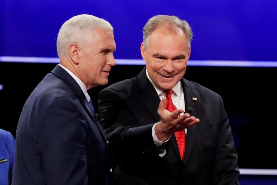 Mike Pence (left) and Tim Kaine walk off the stage after the vice-presidential debate at Longwood University in Virginia on Oct. 4, 2016. 