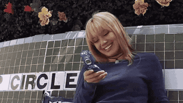 hilary duff in "a cinderella story" texts 'have fun at edc :)'