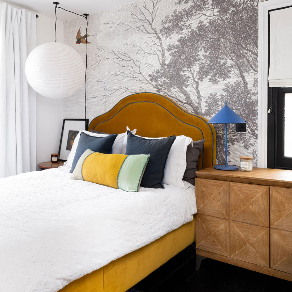 <p> Create a feature wall on the space behind a headboard to give the bed centre stage. This use of print is a great small bedroom idea to make the focus very directional, opening up the rest of the room. </p> <p> If your bedroom features coloured furniture choices sticking to a monochrome wallpaper will help to balance the scheme. </p>