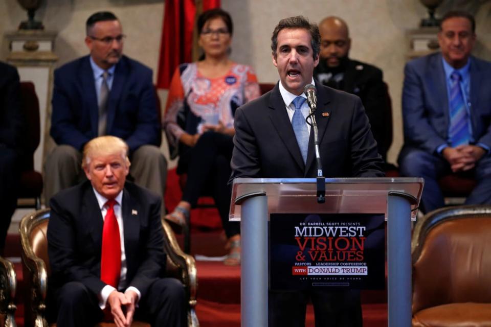 <div class="inline-image__caption"><p>Republican presidential nominee Donald Trump listens as his personal attorney Michael Cohen delivers remarks on his behalf during a campaign stop at the New Spirit Revival Center church in Cleveland Heights, Ohio, U.S., September 21, 2016.</p></div> <div class="inline-image__credit">Reuters/JONATHAN ERNST</div>