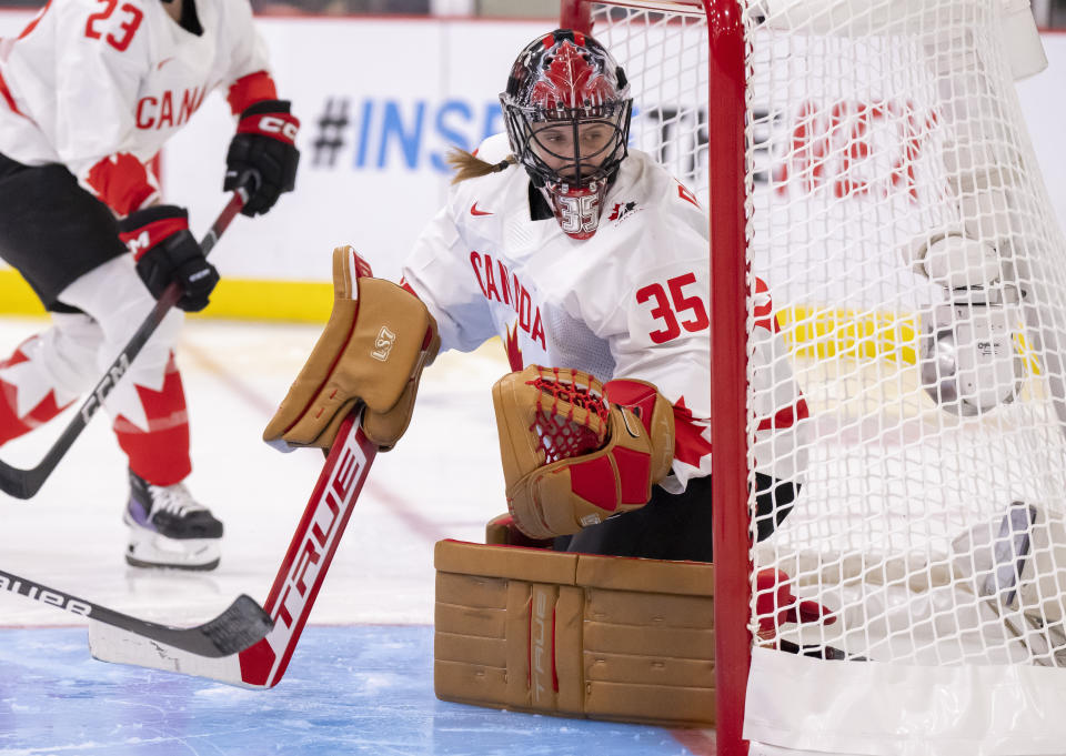 Canada goaltender Ann-Renee Desbiens (35) watches the puck during the third period of a women’s world hockey championships game against Czechia on Friday, April 7, 2023, in Brampton, Ontario. (Frank Gunn/The Canadian Press via AP)
