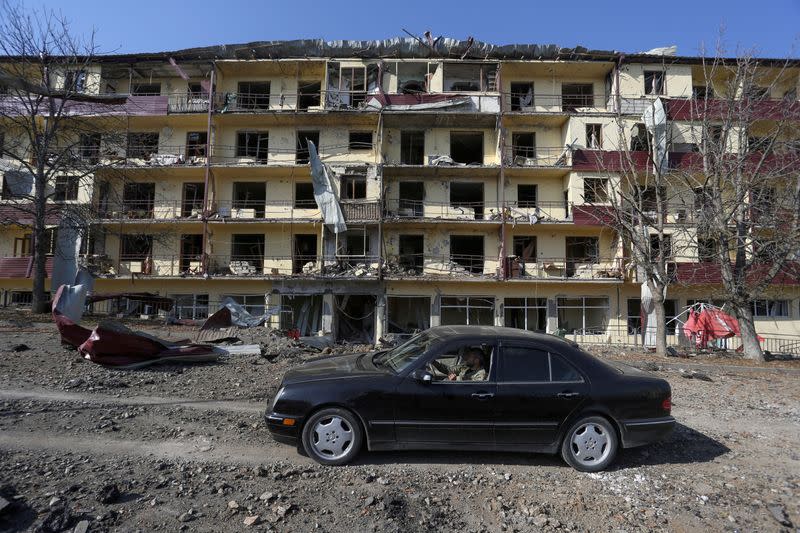 FILE PHOTO: A view shows a damaged building following recent shelling in Shushi