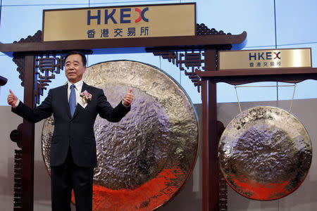 China Tower Corporation Limited Chairman, Executive Director and General Manager Tong Jilu attends the debut of the company at the Hong Kong Exchanges in Hong Kong, China August 8, 2018. REUTERS/Bobby Yip