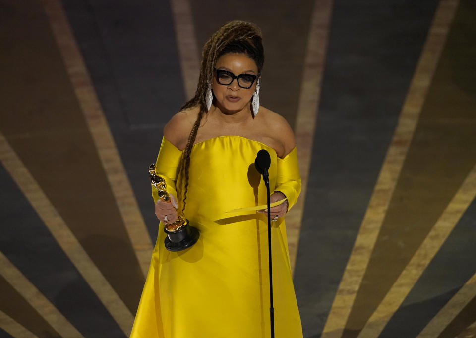 Ruth E. Carter accepts the award for best costume design for "Black Panther: Wakanda Forever" at the Oscars on Sunday, March 12, 2023, at the Dolby Theatre in Los Angeles. (AP Photo/Chris Pizzello)