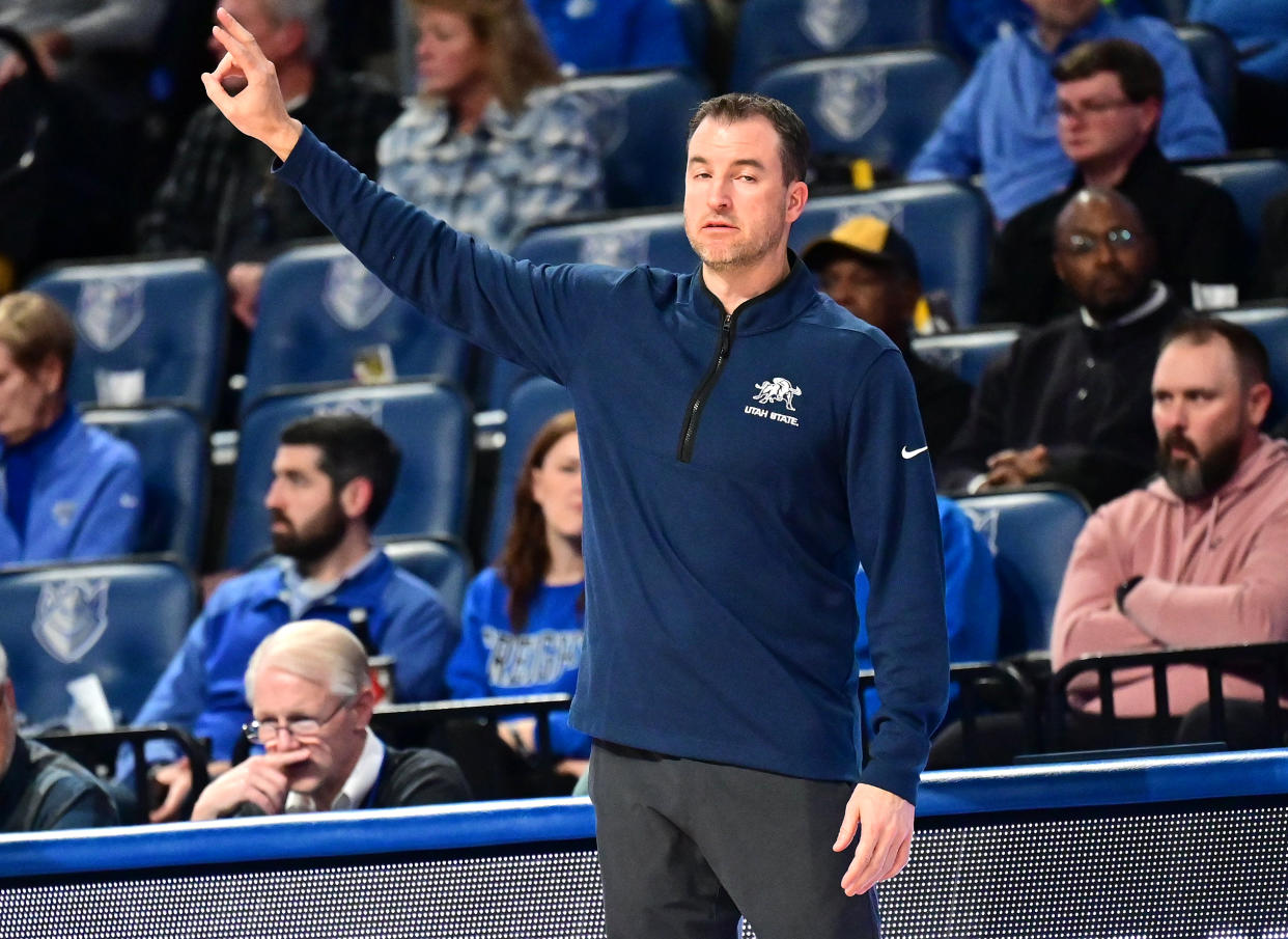 ST. LOUIS, MO - NOVEMBER 28: Utah State head coach Danny Sprinkle gestures to his team during a college basketball game between the Utah State Aggies and the Saint Louis Billikens on November 28, 2023, at Chaifetz Arena in St. Louis, MO. (Photo by Keith Gillett/Icon Sportswire via Getty Images)