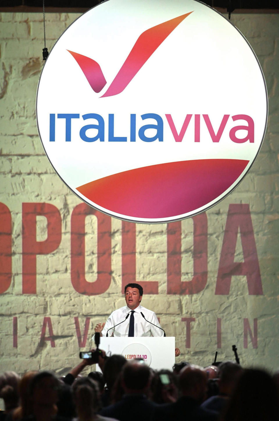 Former Italian Prime Minister and founder of the Italia Viva (Italy alive) party Matteo Renzi speaks at a meeting in Florence, Italy, Sunday, Oct. 20, 2019. (Claudio Giovannini/ANSA via AP)