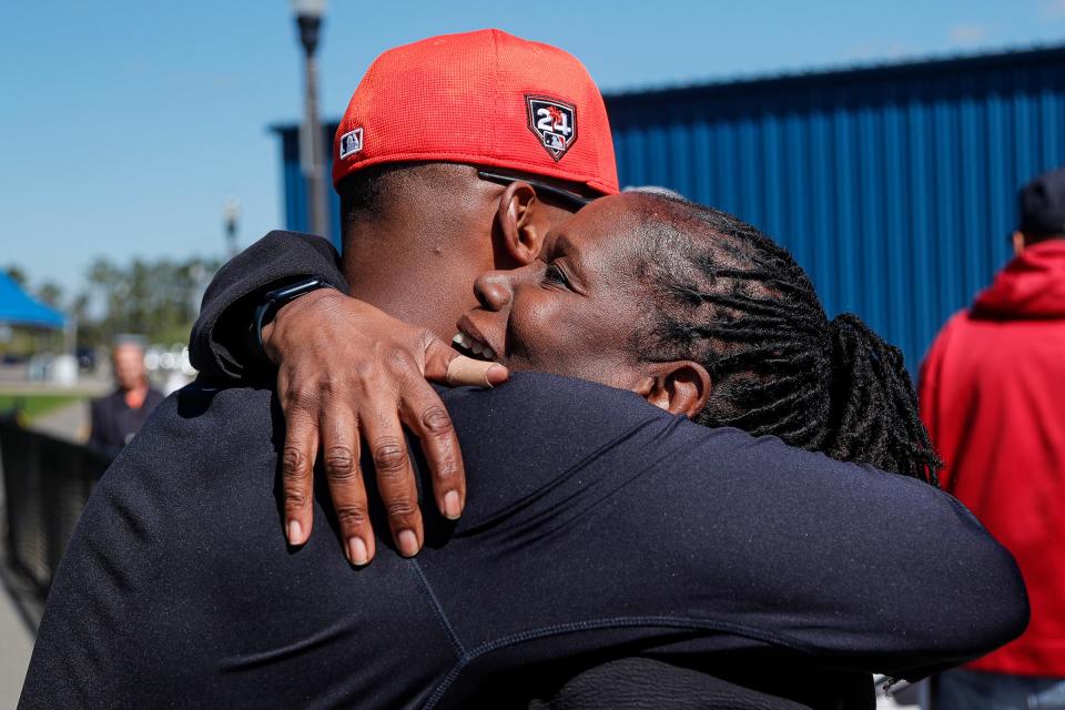 Detroit Tigers outfielder Justyn-Henry Malloy hugs his mother Jacqueline Malloy, who flew in to surprise him for his 24th birthday during spring training at TigerTown in Lakeland, Fla. on Monday, Feb. 19, 2024.