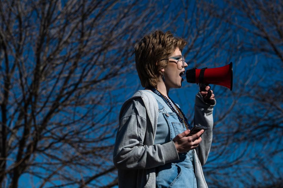 CEC Fort Collins High School student and event organizer Eilee Vichosky speaks into a megaphone during a walkout on Thursday. The walkout was a protest of the recent firing of principal Collin Turbert and what they say is corruption in the Colorado Early Colleges system.