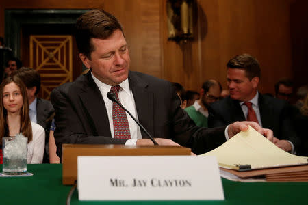Jay Clayton takes his seat to testify at a Senate Banking, Housing and Urban Affairs Committee hearing on his nomination of to be chairman of the Securities and Exchange Commission (SEC) on Capitol Hill in Washington, U.S. March 23, 2017. REUTERS/Jonathan Ernst