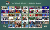 This handout photo provided by G20 Riyadh Summit, shows Saudi King Salman, center, and the rest of world leaders during a virtual G20 summit hosted by Saudi Arabia and held over video conference amid the Covid-19 pandemic, in Riyadh, Saudi Arabia, Saturday, Nov. 21, 2020. (G20 Riyadh Summit via AP)
