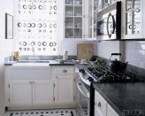 This kitchen is sleek and modern with a simple black and white color palette - just the style we'd expect from Sex and the City creator Candace Bushnell's apartment in Greenwich Village. Source: Ann Weintraub Ltd