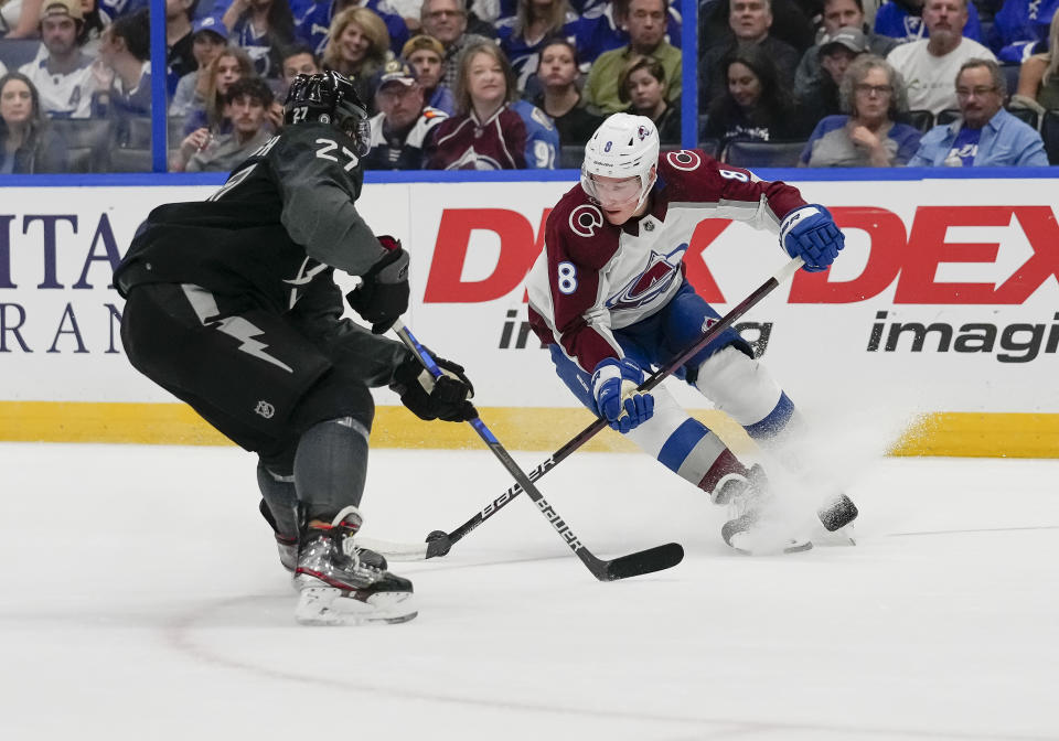 TAMPA, FL - OCTOBER 23:Tampa Bay Lightning defenseman Ryan McDonagh (27) and Colorado Avalanche defenseman Cale Makar (8) during the NHL Hockey match between the Tampa Bay Lightning and Colorado Avalanche on October 23, 2021 at Amalie Arena in Tampa, FL. (Photo by Andrew Bershaw/Icon Sportswire via Getty Images)