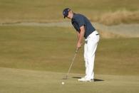 Jun 21, 2015; University Place, WA, USA; Jordan Spieth putts on the 14th green in the final round of the 2015 U.S. Open golf tournament at Chambers Bay. Mandatory Credit: John David Mercer-USA TODAY Sports