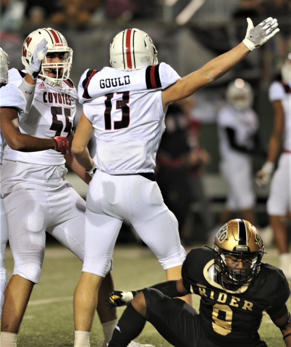 Wichita Falls High's Cameron Gould pushes forward and gains a first down against Rider on Friday, November 5, 2021 at Memorial Stadium.