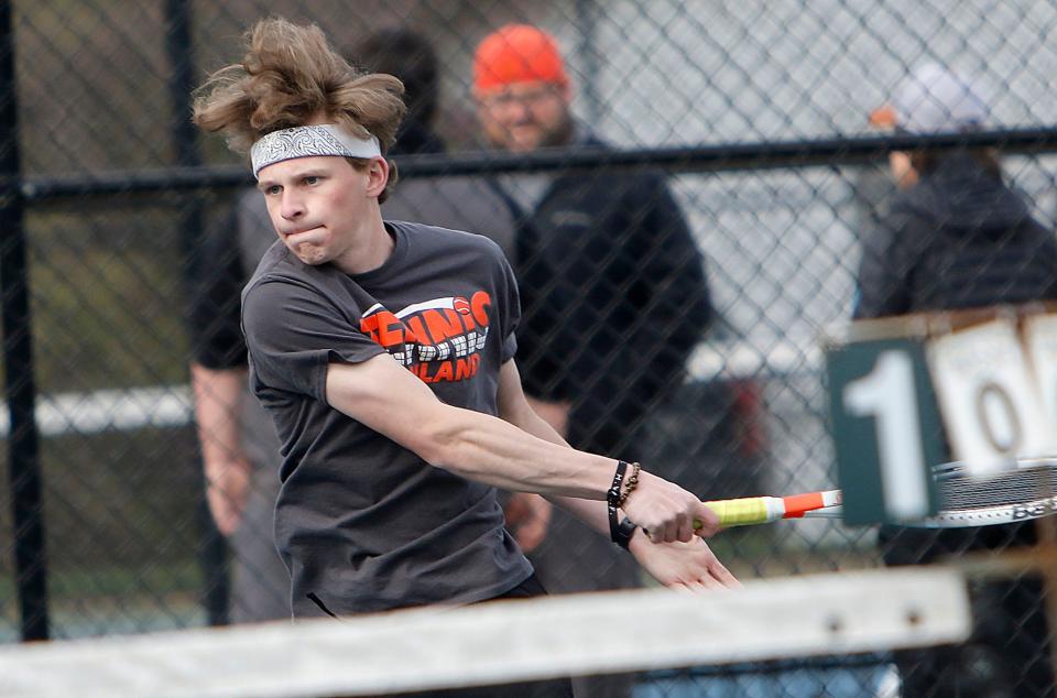 Ashland's Seth Karnosh returns a shot during his first doubles match against Mount Vernon Thursday, April 28, 2022 at Brookside Park.