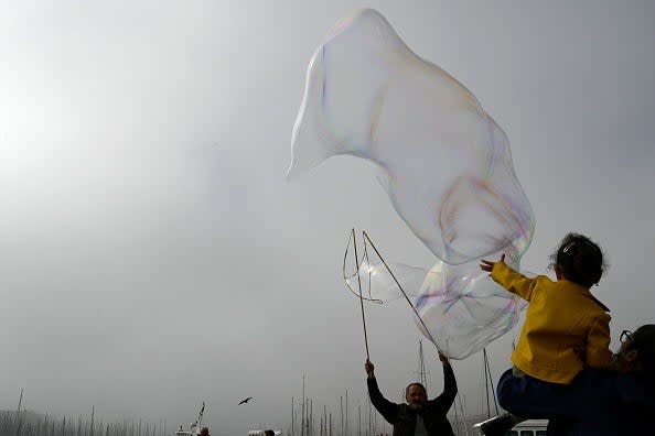 <p>Representative: A girl playing with soap bubbles</p> (AFP via Getty Images)