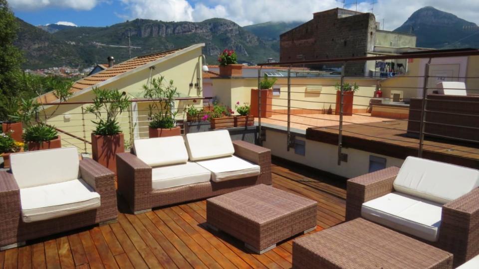 Rooftop terrace with mountain views and lots of seating