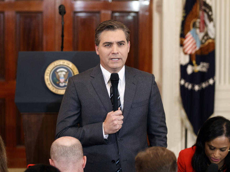 FILE - In this Nov. 7, 2018, file photo, CNN journalist Jim Acosta does a standup before a new conference with President Donald Trump in the East Room of the White House in Washington. CNN sued the Trump administration Tuesday, demanding that correspondent Jim Acosta’s credentials to cover the White House be returned because it violates the constitutional right of freedom of the press. (AP Photo/Evan Vucci, File)
