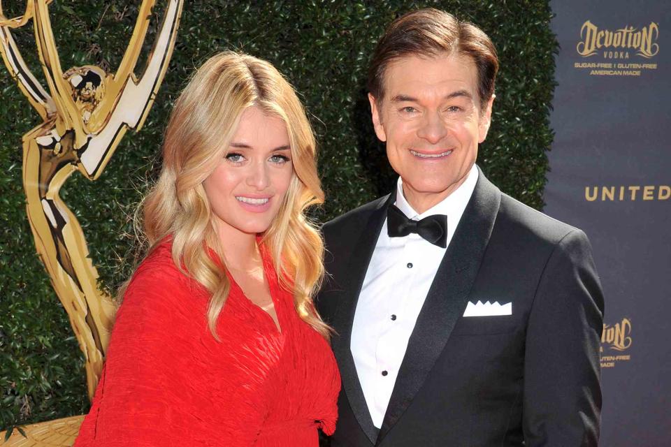 <p>Gregg DeGuire/WireImage</p> Daphne Oz and Dr. Mehmet Oz arrive at the 44th Annual Daytime Emmy Awards on April 30, 2017 in Pasadena, California. 