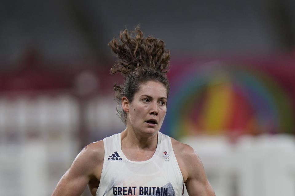 Kate French of Great Britain competes in the running and shooting portion in the women's modern pentathlon at the 2020 Summer Olympics, Friday, Aug. 6, 2021, in Tokyo, Japan. (AP Photo/Hassan Ammar)