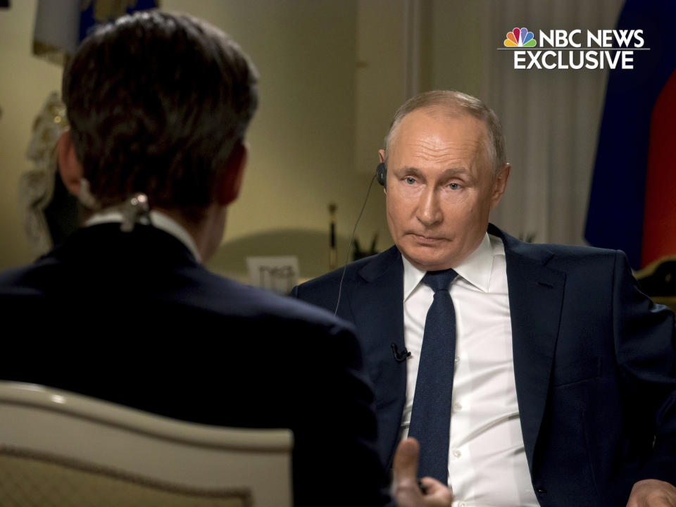 In this image provided by NBC News, Keir Simmons, left, speaks with Russian President Vladimir Putin in an interview aired on Monday, June 14, 2021, two days before the Russian leader is to meet U.S. President Joe Biden in Geneva. Putin has sharply dismissed allegations that his country is carrying out cyberattacks against the United States as baseless. (NBC News via AP)