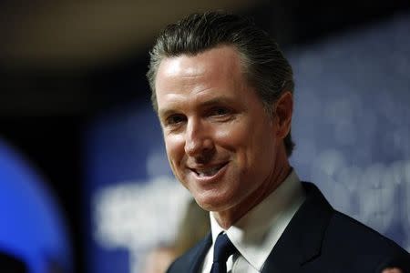 California Lt. Governor Gavin Newsom arrives on the red carpet during the 2nd annual Breakthrough Prize Award in Mountain View, California November 9, 2014. REUTERS/Stephen Lam