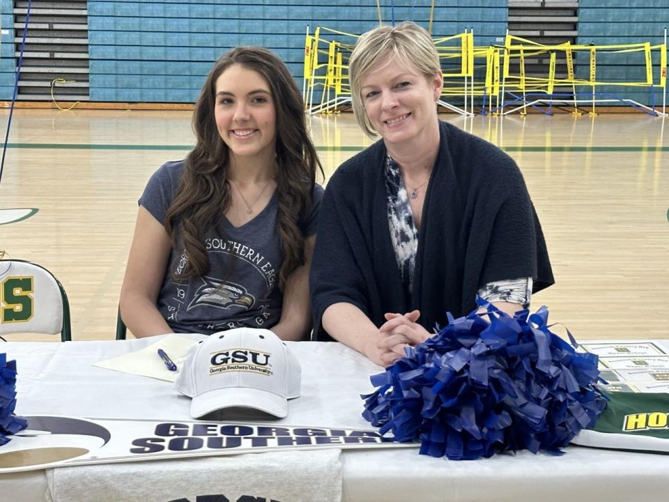 Keeley Daughtry of Savannah Country Day, with her mother, as she signed to become a cheerleader at Georgia Southern.