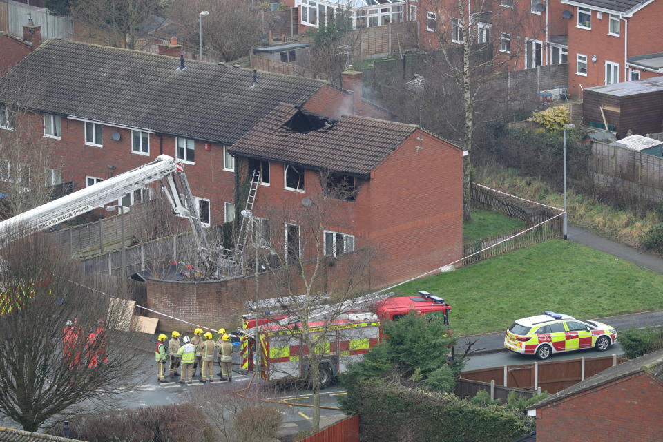 The 24-year-old woman and 28-year-old man remain in custody as police investigate the blaze in Stafford on Tuesday.