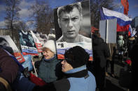 <p>People gather together prior a march in memory of opposition leader Boris Nemtsov, who was killed two years ago, in Moscow, Russia, Sunday, Feb. 26, 2017. Several thousand people held a march in Moscow in memory of the Russian opposition leader to mark the second anniversary of his killing. (Photo: Pavel Golovkin/AP) </p>