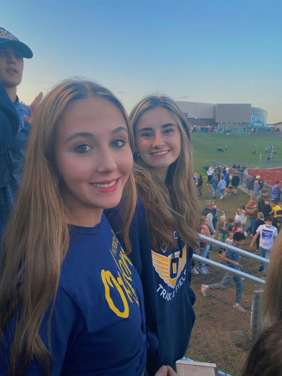 Madeline Johnson, left, pictured with Madisyn Baldwin at an Oxford High School football game. Baldwin was killed during a November school shooting. Johnson is organizing with March For Our Lives and No Future Without Today against gun violence.