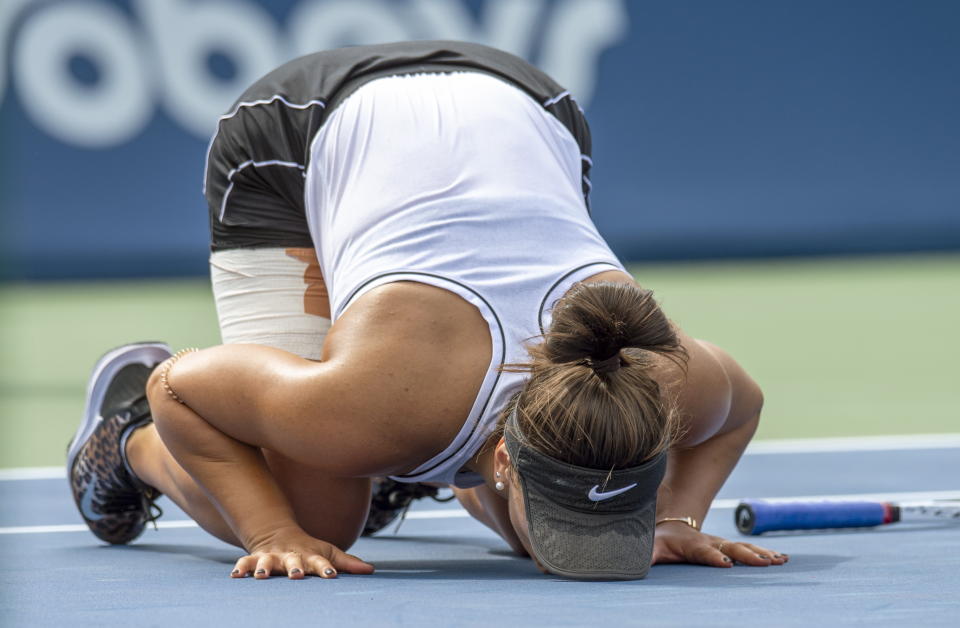 Bianca Andreescu, of Canada, celebrates after defeating Sofia Kenin, of the United States, during the Rogers Cup women’s tennis tournament Saturday, Aug. 10, 2019, in Toronto. (Frank Gunn/The Canadian Press via AP)